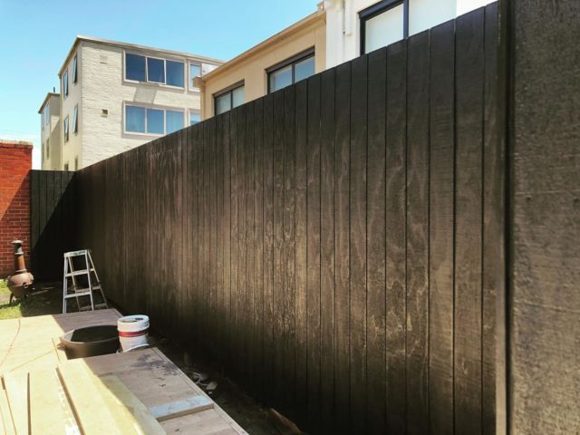 After building a  Millboard deck the client got us back to cover up an unsightly fence. He wanted something modern so we came up with this.